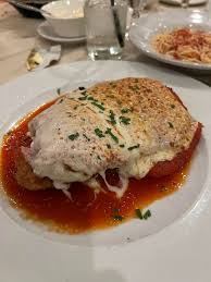 Casa Bellissima signature dishes Chicken Parmigiana, Lasagne, Scallops Risotto.
